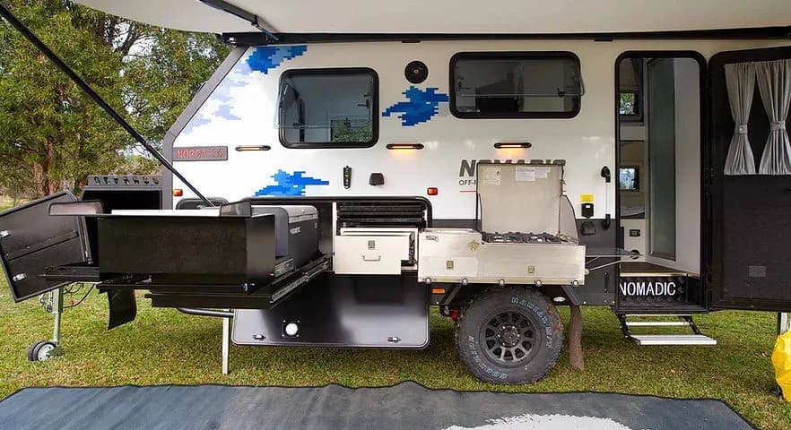 Dusk campsite, awning lights on