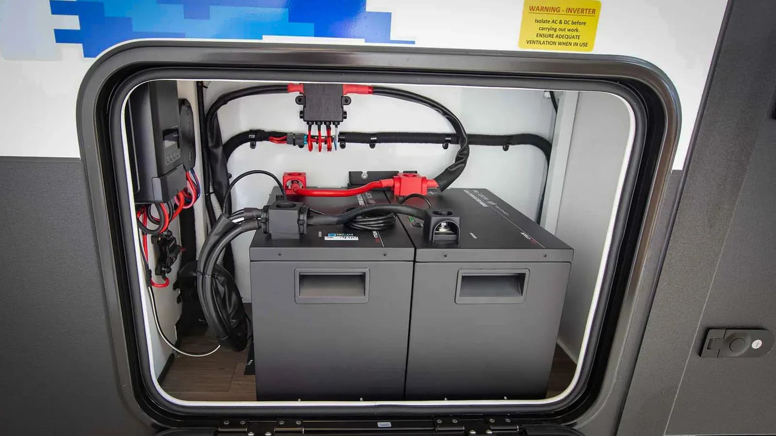 Projecta lithium power management system fitted in a Nomadic camper battery bay